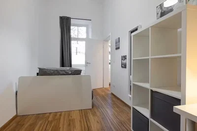Bedroom; wood floor, natural light