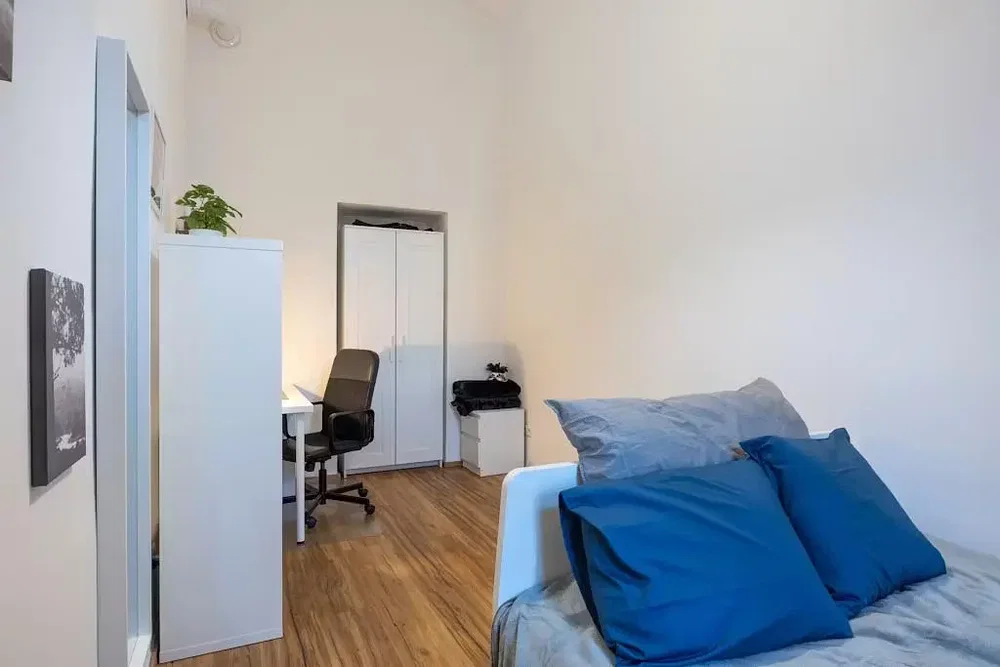 Bedroom; wood floor, natural light