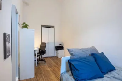 Bedroom; wood floor, natural light