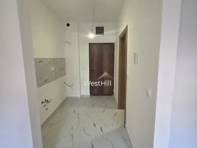Cloakroom; tile floor, needs renovation