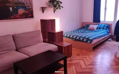 Bedroom; wood floor, natural light