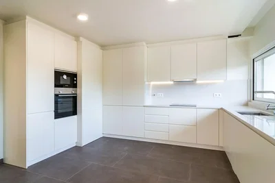 Kitchen; kitchen appliances, tile floor, natural light, renovated
