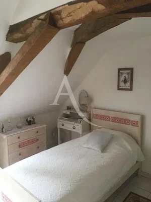 Camera da letto; travi in legno, luce naturale