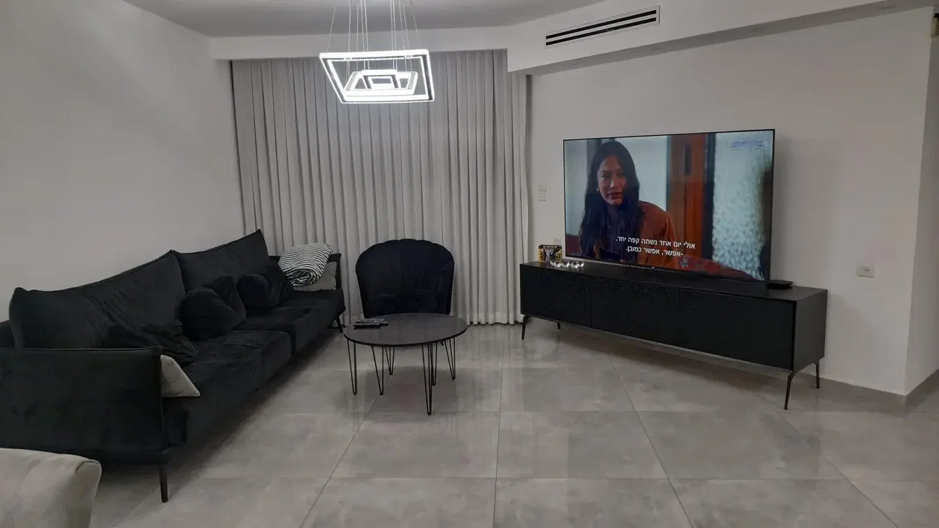 Living room; tile floor, natural light, modern style