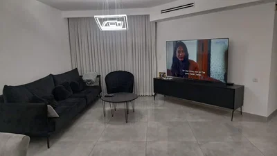Living room; tile floor, natural light, modern style
