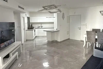 Living room; tile floor, natural light, modern style, kitchen appliances