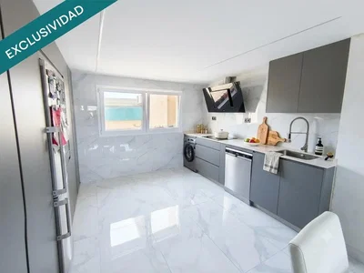 Kitchen; kitchen appliances, tile floor, natural light