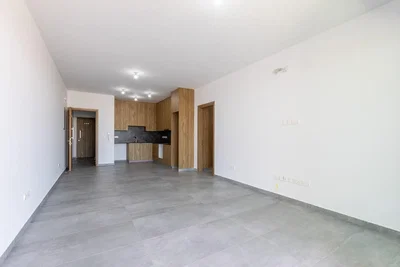 Living room; tile floor, natural light, needs renovation
