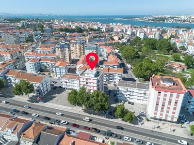 House and surroundings; view