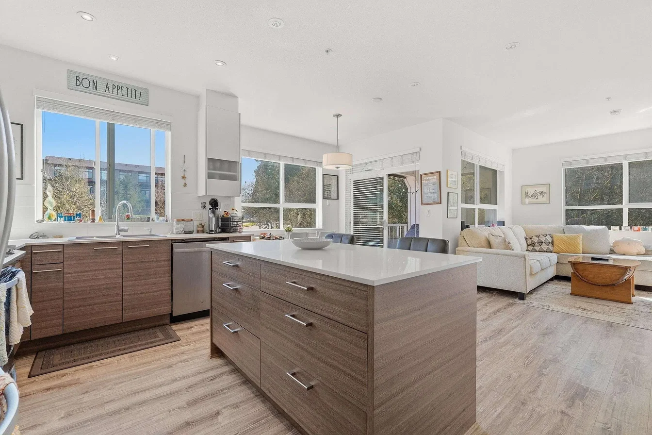 Kitchen; kitchen appliances, wood floor, natural light