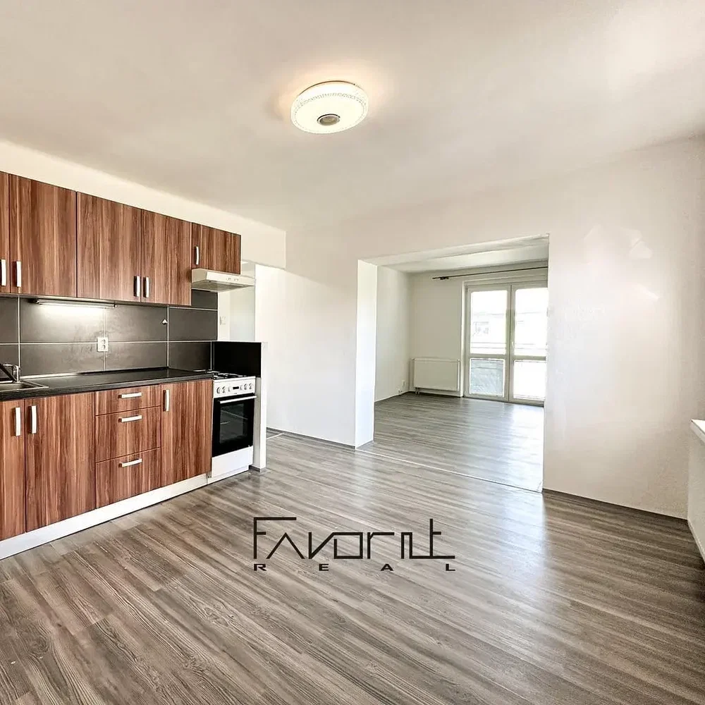 Kitchen; kitchen appliances, wood floor, natural light, renovated