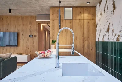 Kitchen; kitchen appliances, wood floor, tile floor, high ceiling, renovated, natural light