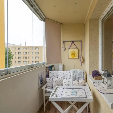 Balcony; natural light, wood floor