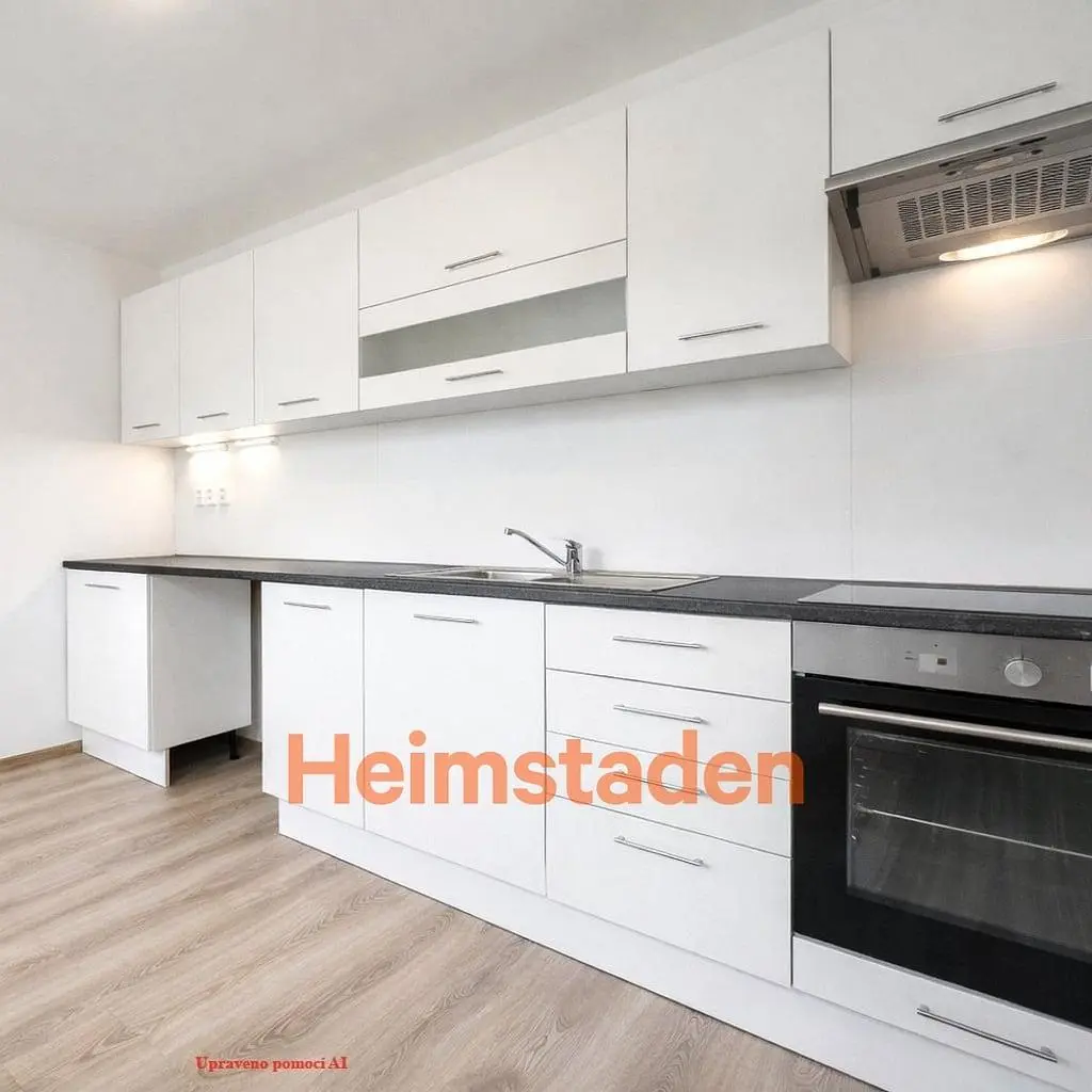 Kitchen; kitchen appliances, wood floor, natural light