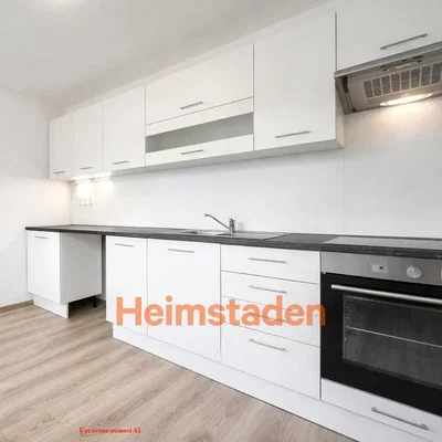 Kitchen; kitchen appliances, wood floor, natural light
