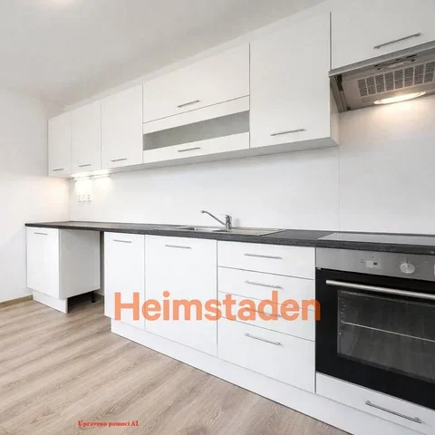 Kitchen; kitchen appliances, wood floor, natural light