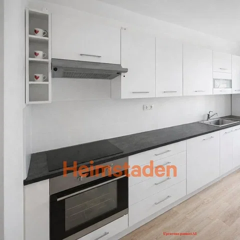 Kitchen; kitchen appliances, wood floor, renovated, natural light