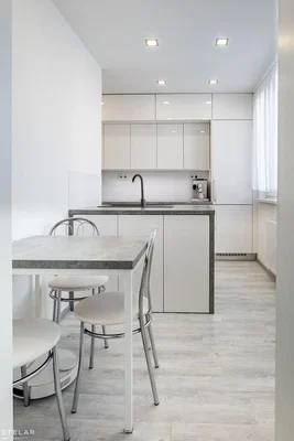 Kitchen; kitchen appliances, tile floor, natural light, modern style, renovated