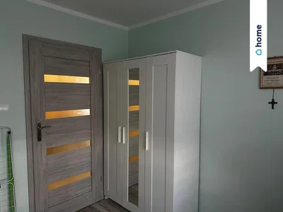 Bedroom; wood floor, tile floor, high ceiling, wood beams, renovated, natural light, modern style