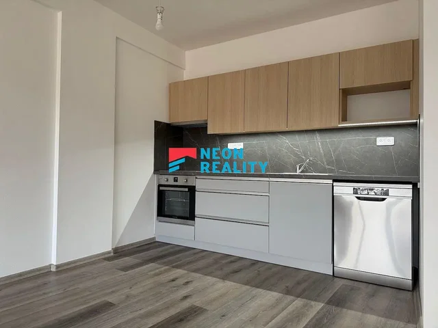 Kitchen; kitchen appliances, wood floor, natural light