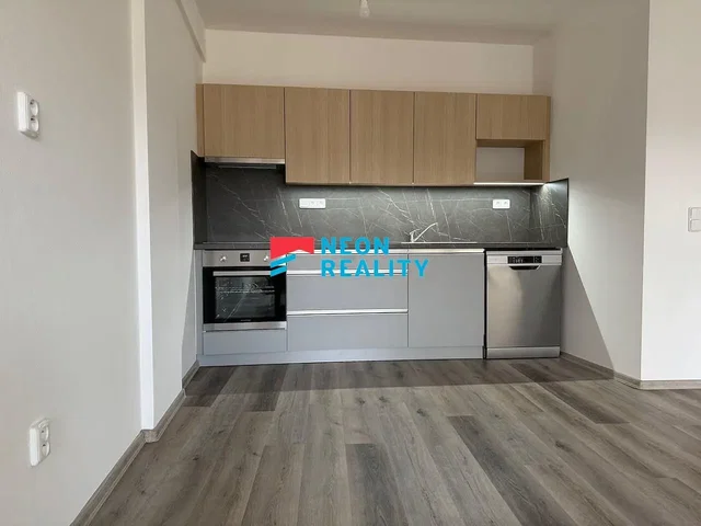 Kitchen; kitchen appliances, wood floor, natural light