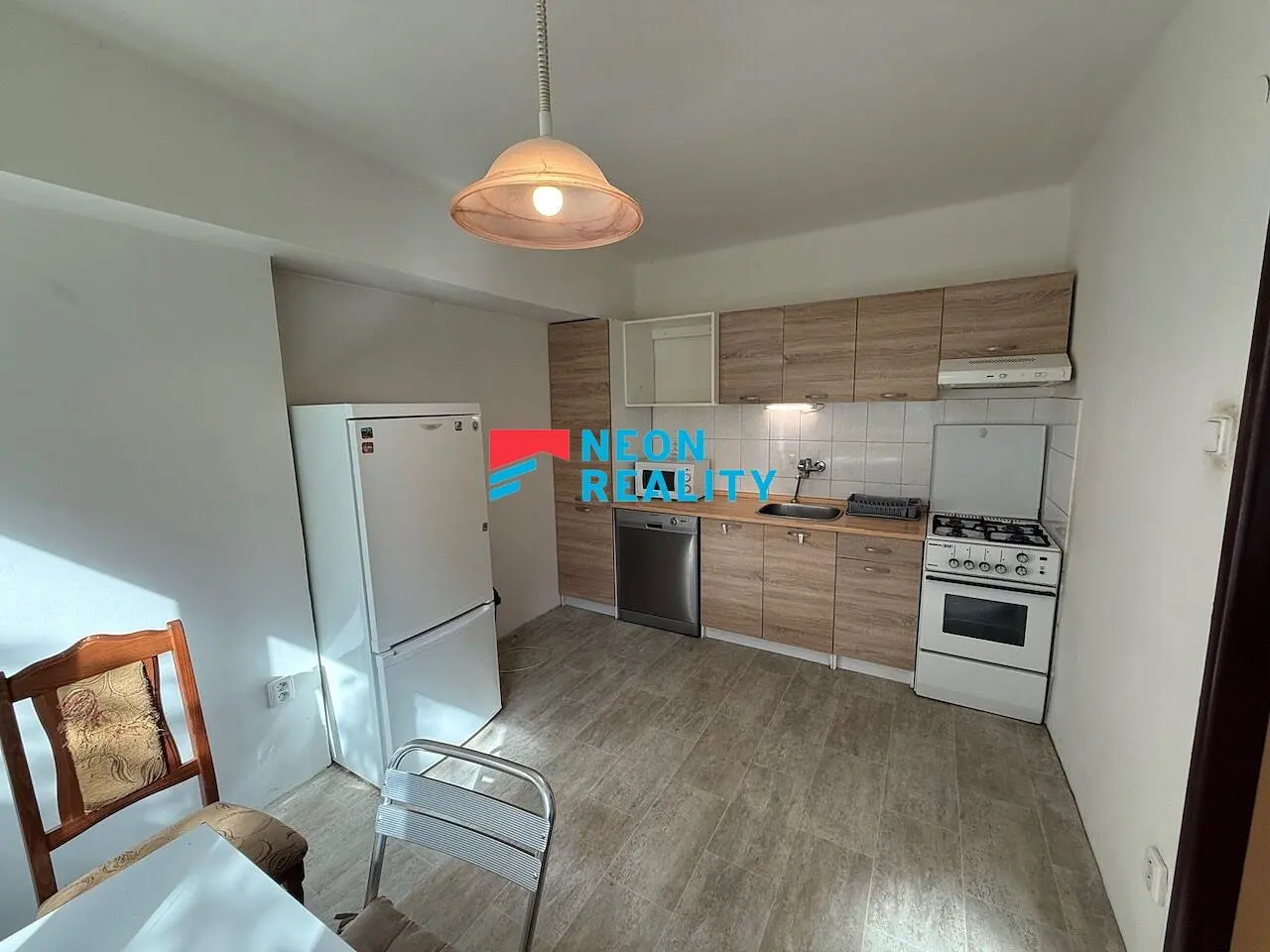 Kitchen; kitchen appliances, tile floor, natural light
