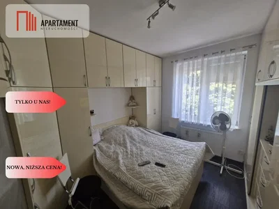Slaapkamer; houten vloer, natuurlijk licht