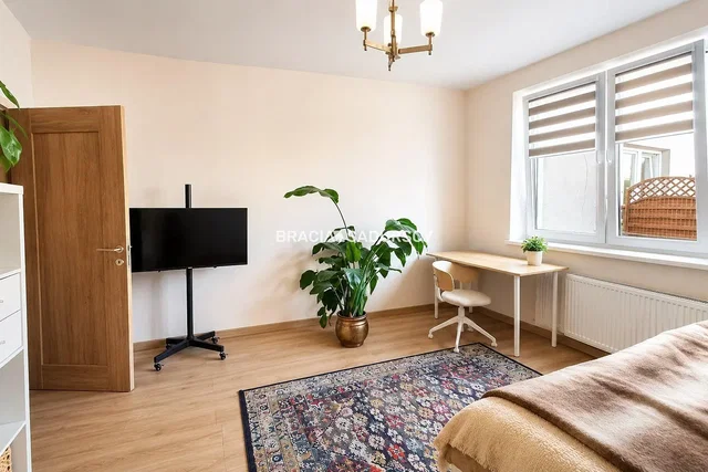 Bedroom; natural light, wood floor