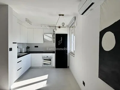 Kitchen; kitchen appliances, natural light, tile floor
