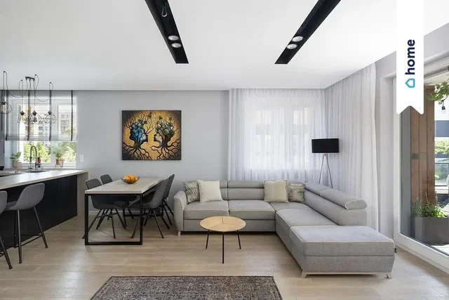 Salón; estilo moderno, suelo de madera, luz natural, electrodomésticos