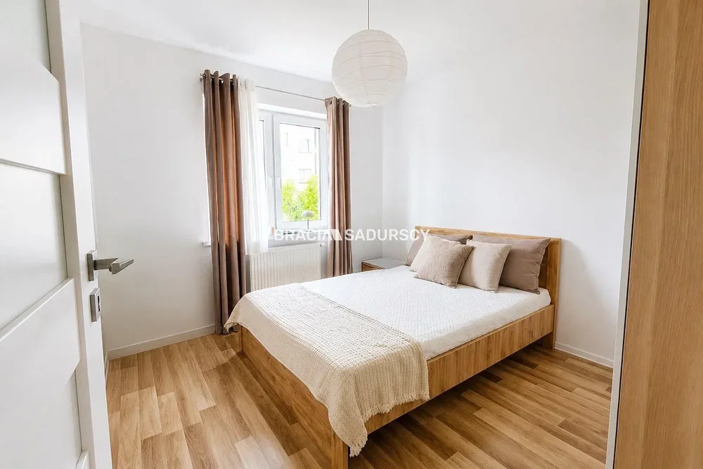 Bedroom; wood floor, natural light