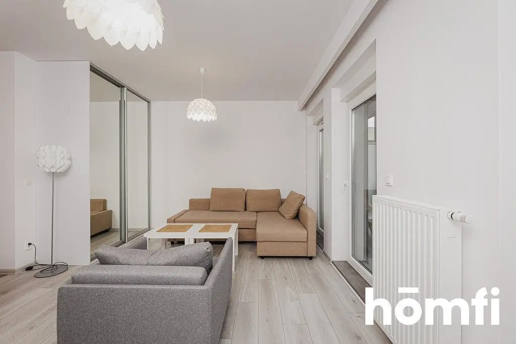 Woonkamer; natuurlijk licht, moderne stijl, houten vloer