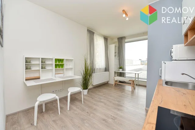 Kitchen; kitchen appliances, wood floor, natural light