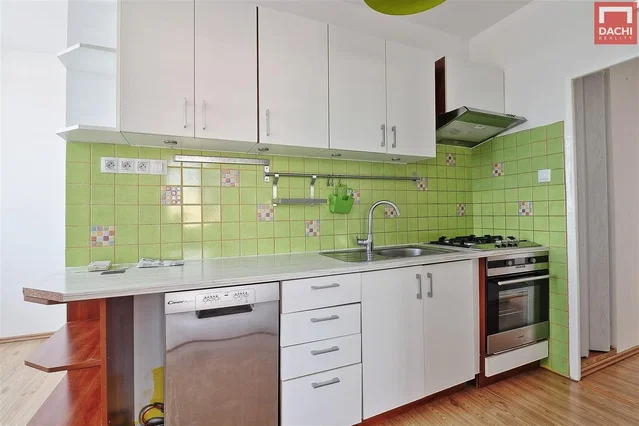Kitchen; kitchen appliances, tile floor, wood floor, renovated, natural light