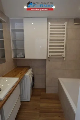 Bathroom; wood floor, tile floor, renovated, natural light