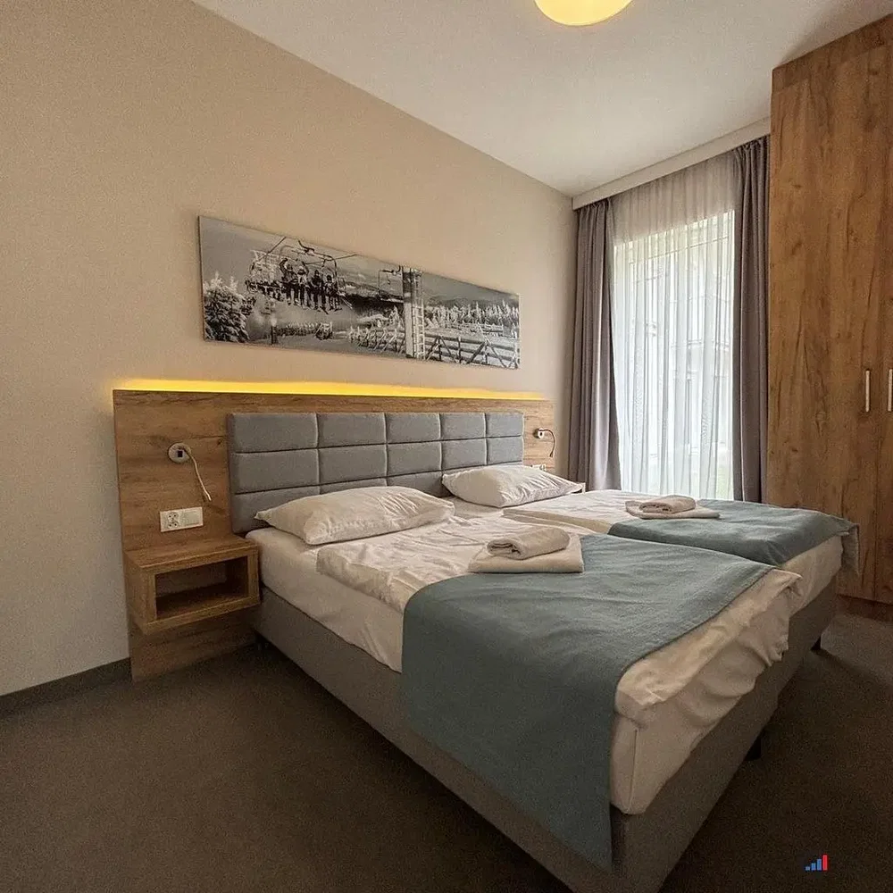Bedroom; wood floor, natural light, modern style