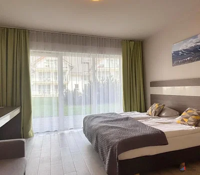 Bedroom; natural light, tile floor