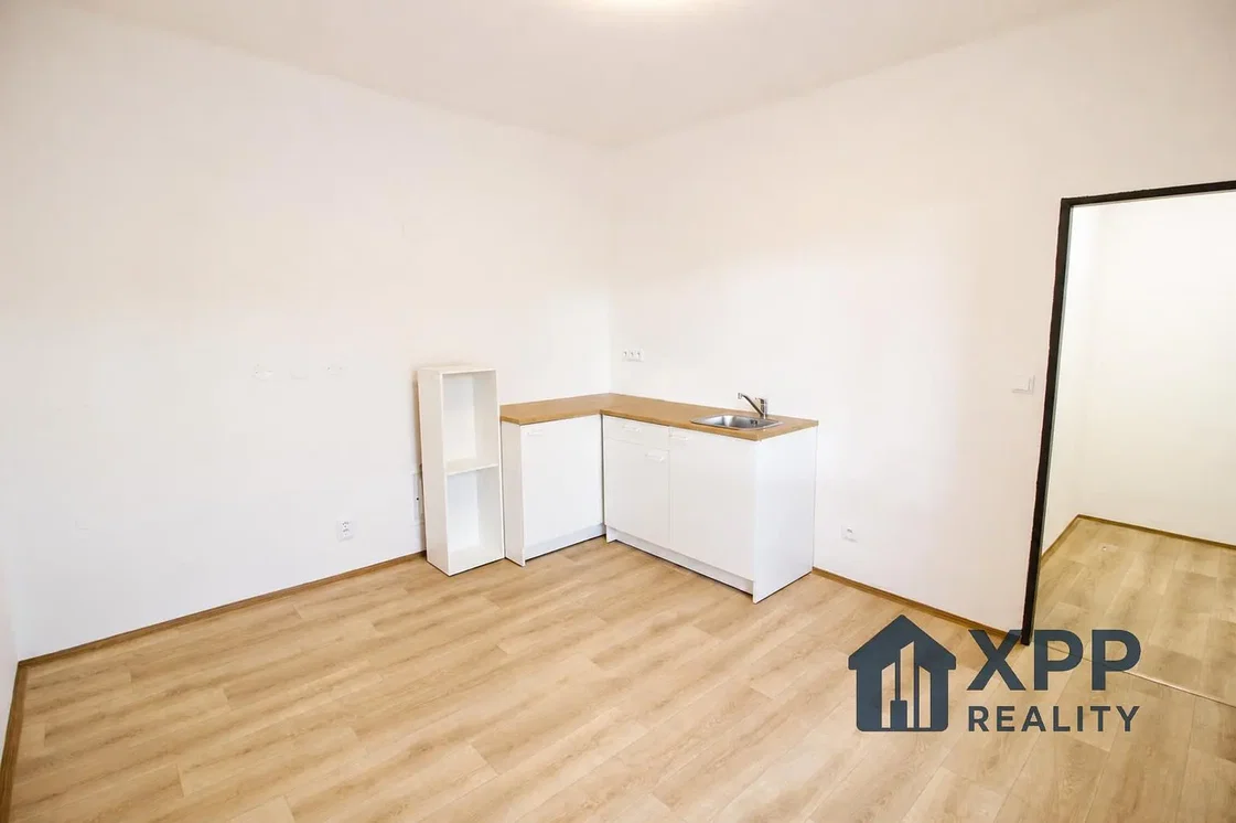 Kitchen; wood floor, natural light, needs renovation