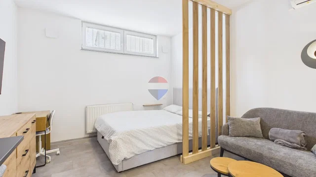 Bedroom; natural light, wood floor