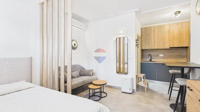 Bedroom; kitchen appliances, natural light, modern style