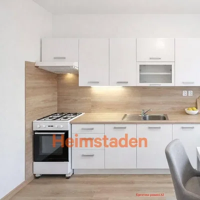 Kitchen; kitchen appliances, wood floor, natural light, renovated