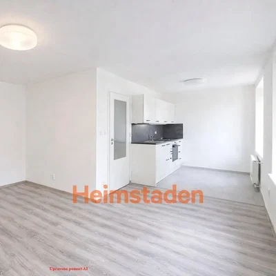 Kitchen; kitchen appliances, tile floor, natural light