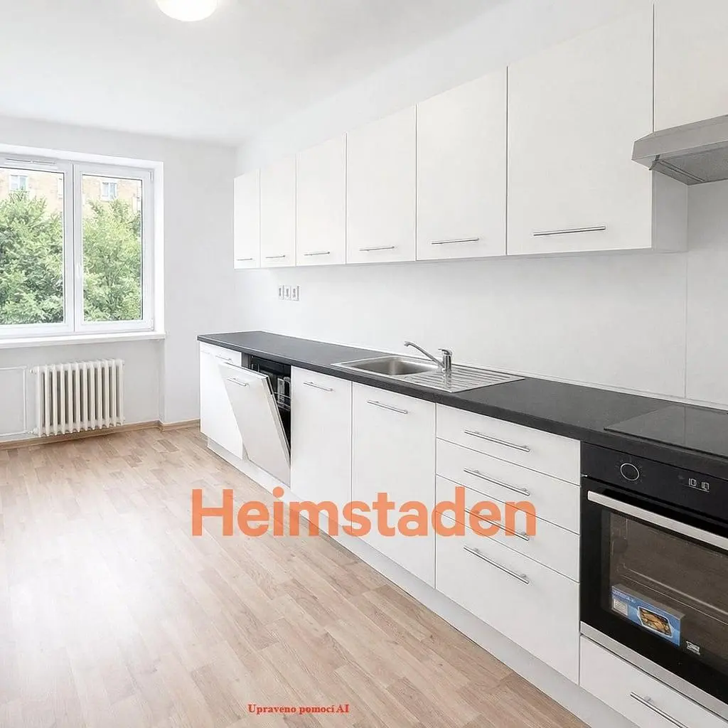 Kitchen; kitchen appliances, wood floor, natural light