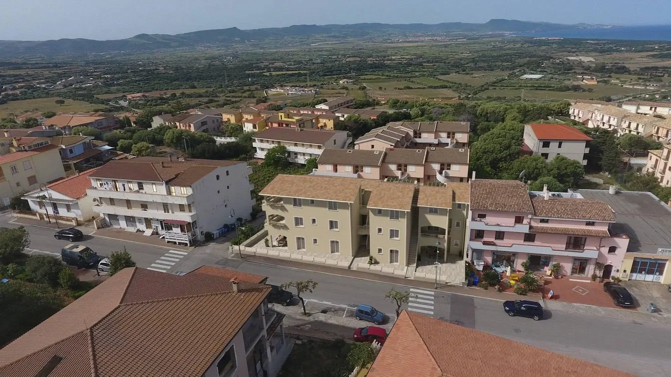 House and surroundings; view