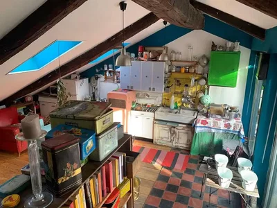 Kitchen; kitchen appliances, wood floor, needs renovation, natural light