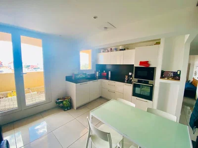 Kitchen; kitchen appliances, tile floor, natural light, modern style