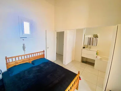 Bedroom; tile floor, natural light