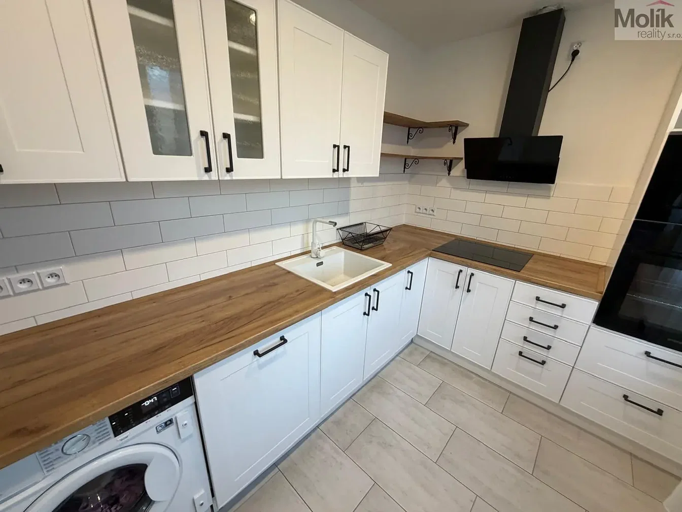 Kitchen; kitchen appliances, tile floor, renovated, natural light