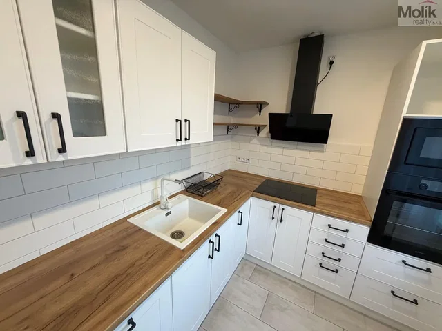 Kitchen; kitchen appliances, tile floor, renovated, natural light