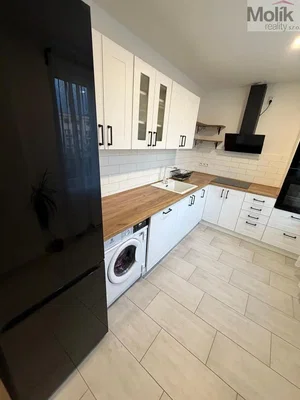 Kitchen; kitchen appliances, tile floor, renovated, natural light
